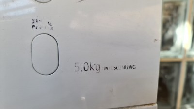 Надпись с весом 5.0 кг и моделью устройства